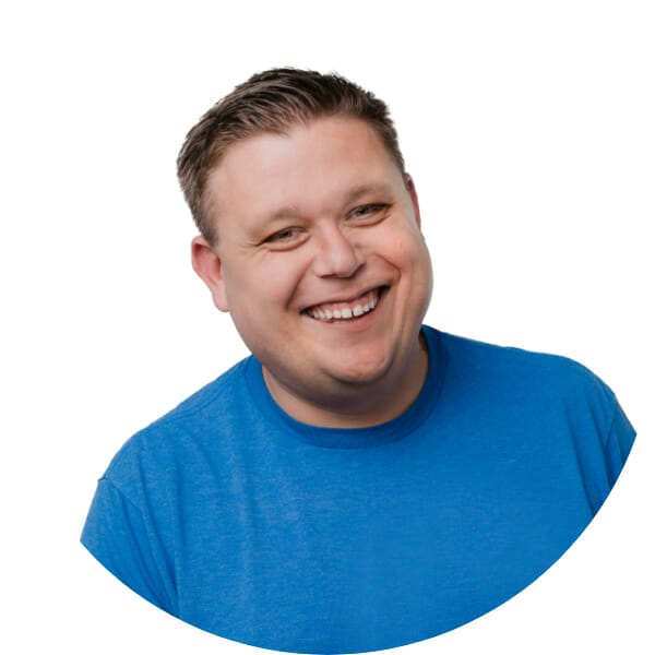 Randy smiling in a blue shirt
